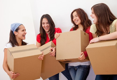 Organized storage facility with labelled boxes and furniture