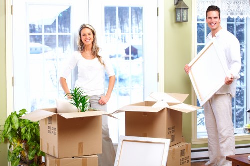Team handling specialist items during removals in Burroughs