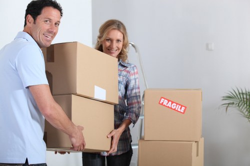 House move in progress with removal van and packed boxes
